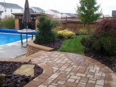 Paver walkway and pool surround with landscaping dayton ohio