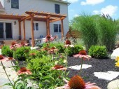 Custom backyard garden with pergola and paver walkway dayton ohio